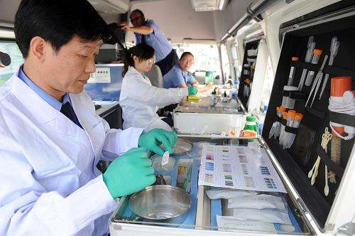 食品安全快速检测车让菜贩把紧进货渠道